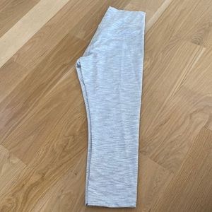 LuLu Lemon grey/white striped Capri leggings.